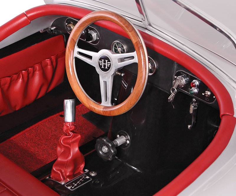 Illustration for article titled A Tiny Drivable Jaguar Replica Might Be the Perfect Car For Big City Commutes